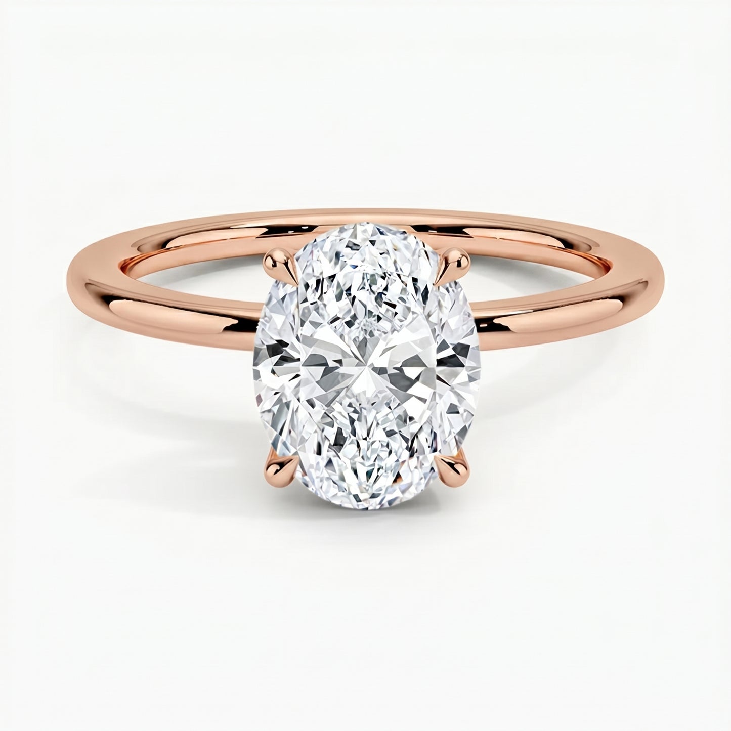 Classic Four-Prong Oval Solitaire Ring