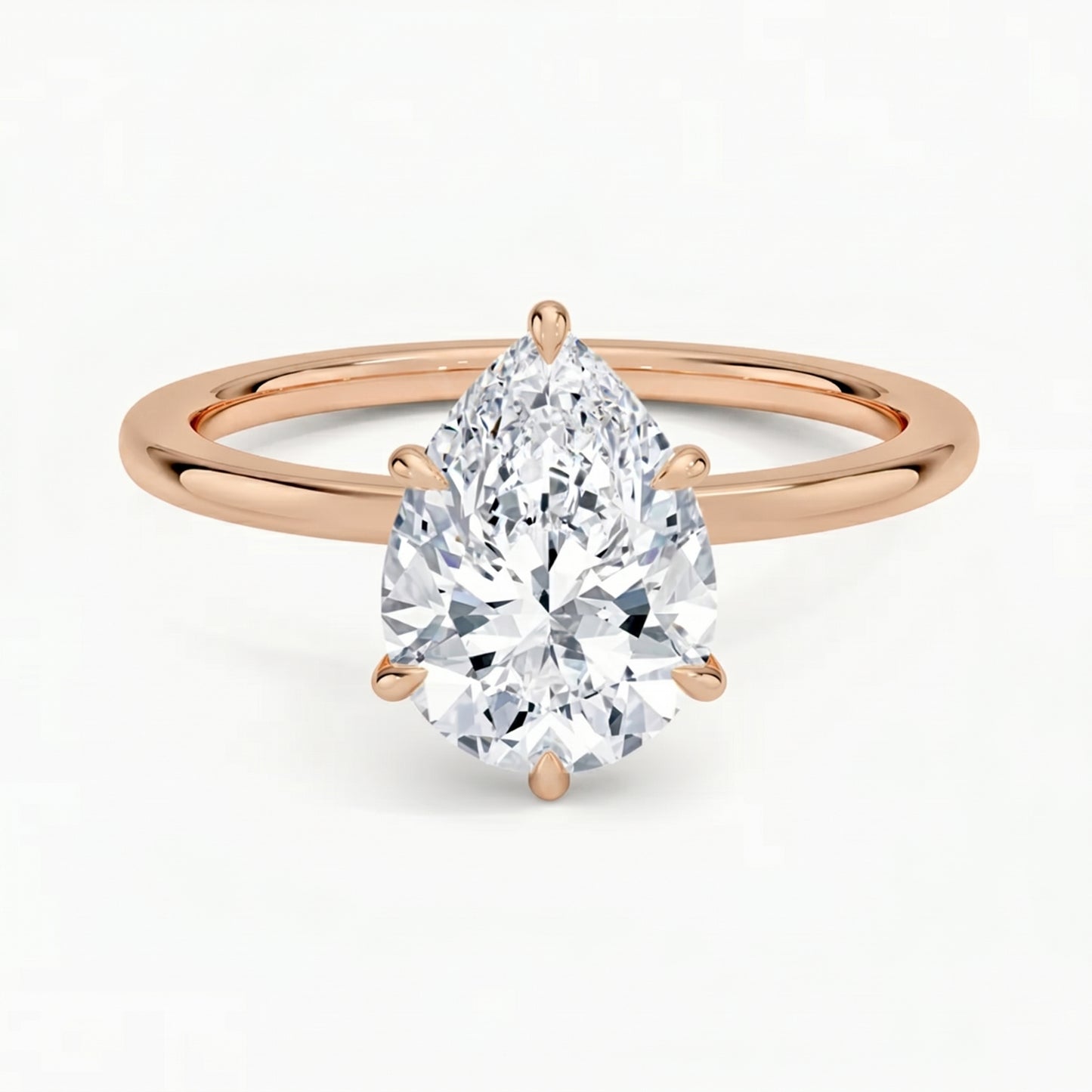 Hidden Halo Pear Solitaire Ring