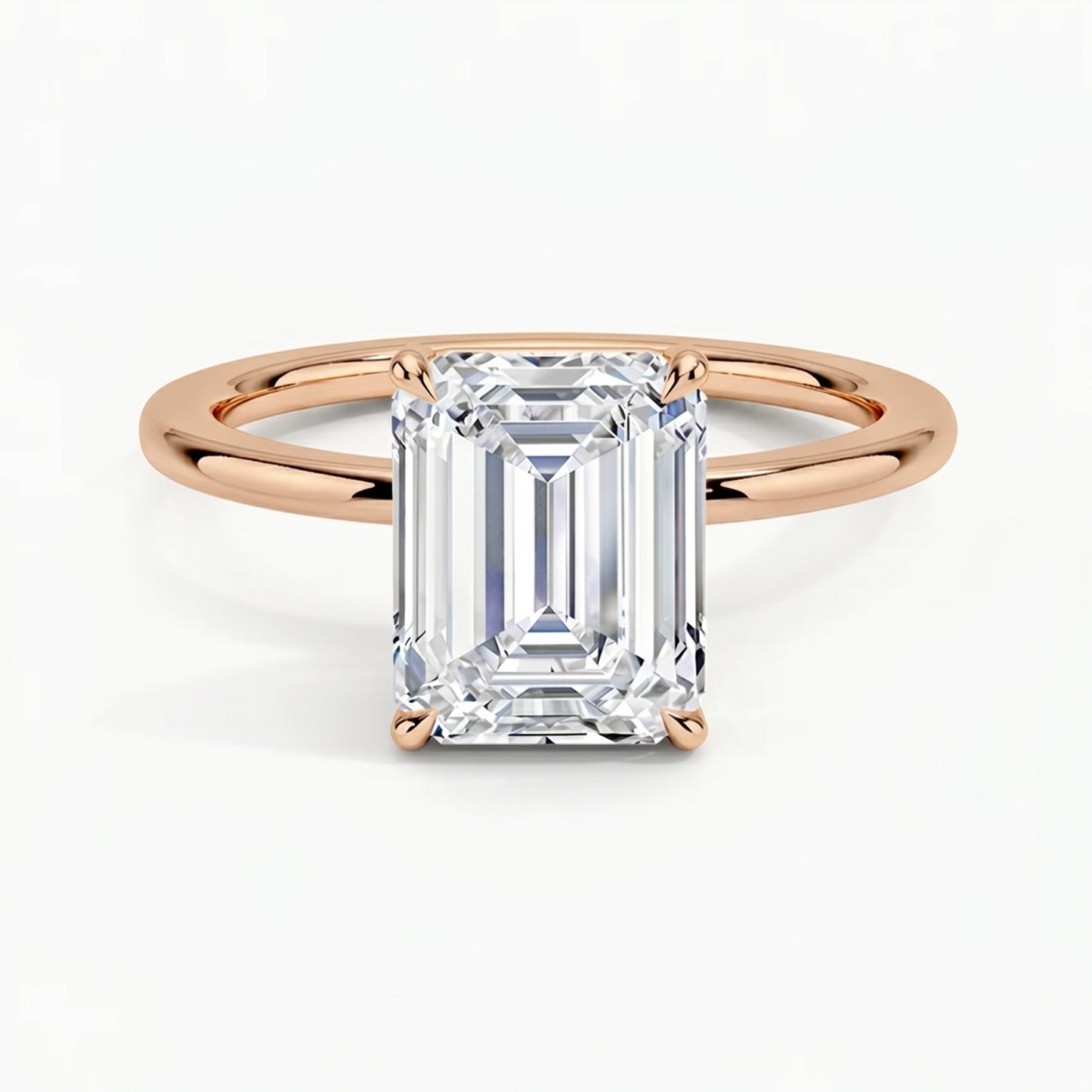 Classic Four-Prong Emerald Solitaire Ring