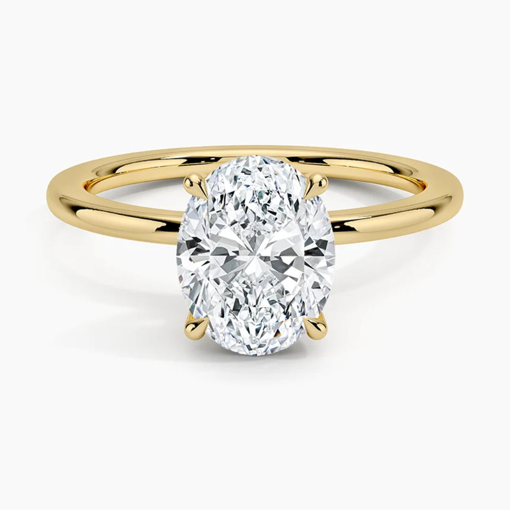 Classic Four-Prong Oval Solitaire Ring