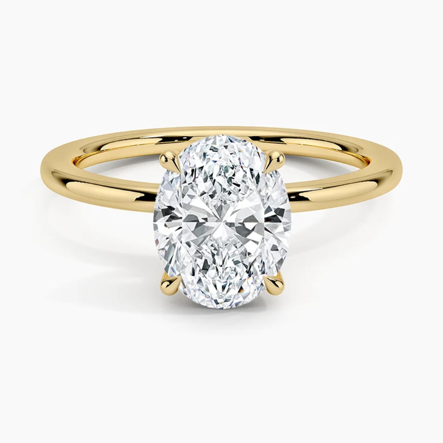 Classic Four-Prong Oval Solitaire Ring