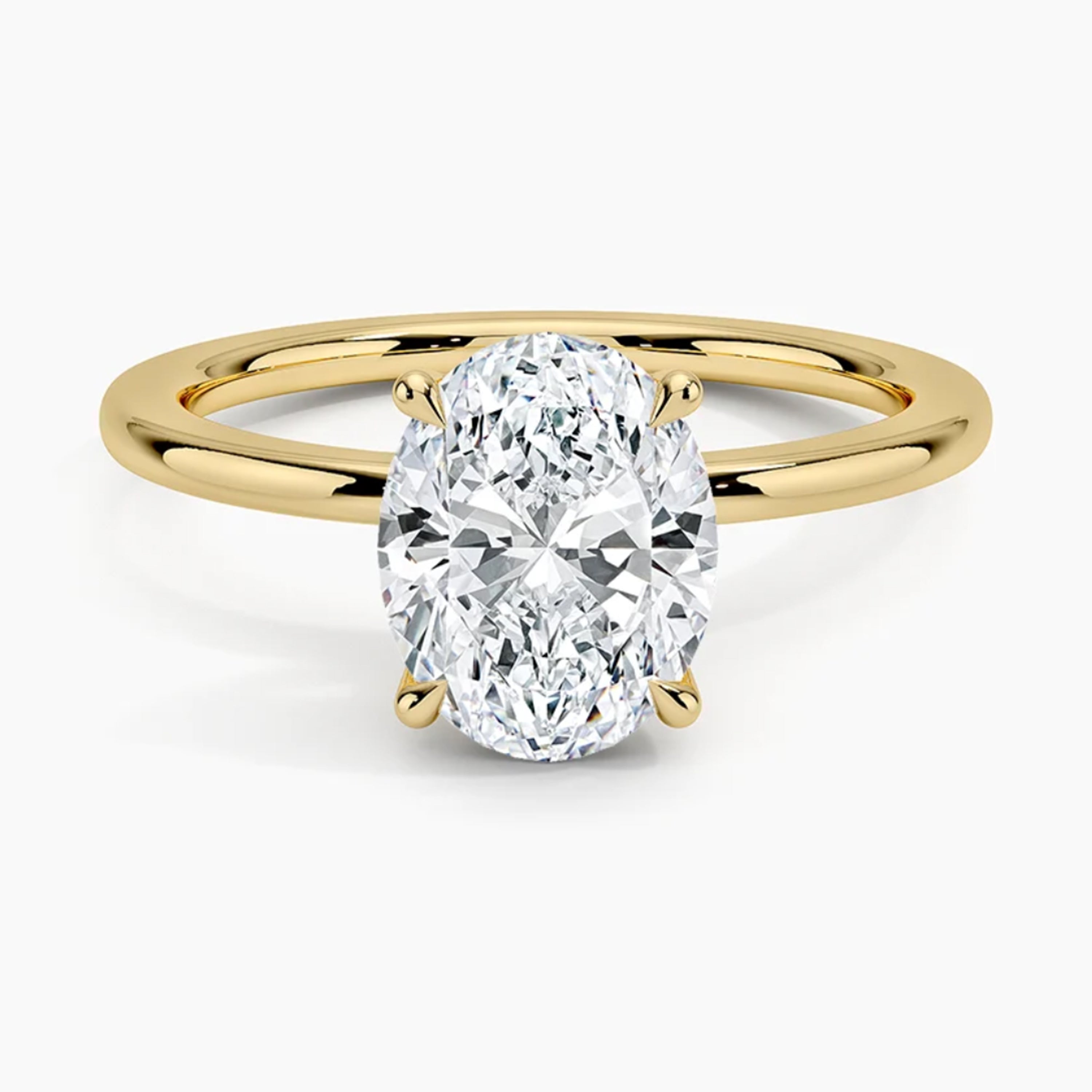 Classic Four-Prong Oval Solitaire Ring