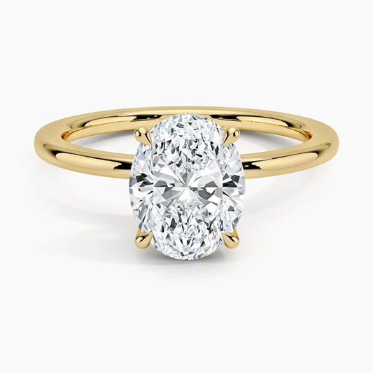 Classic Four-Prong Oval Solitaire Ring