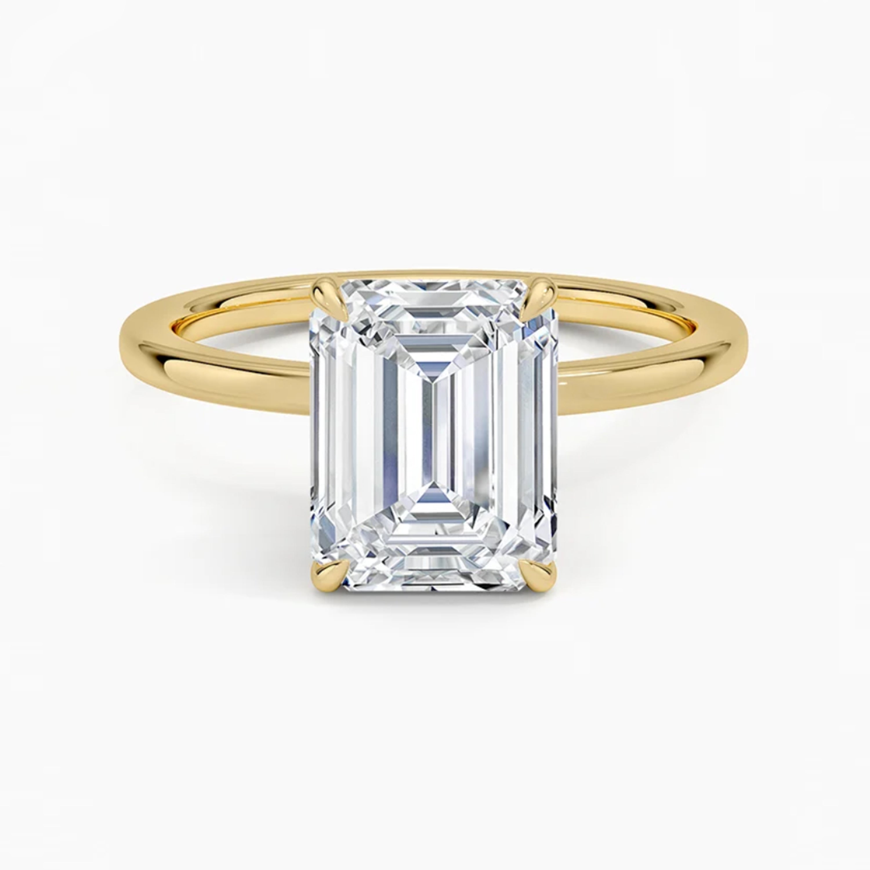 Hidden Halo Emerald Solitaire Ring