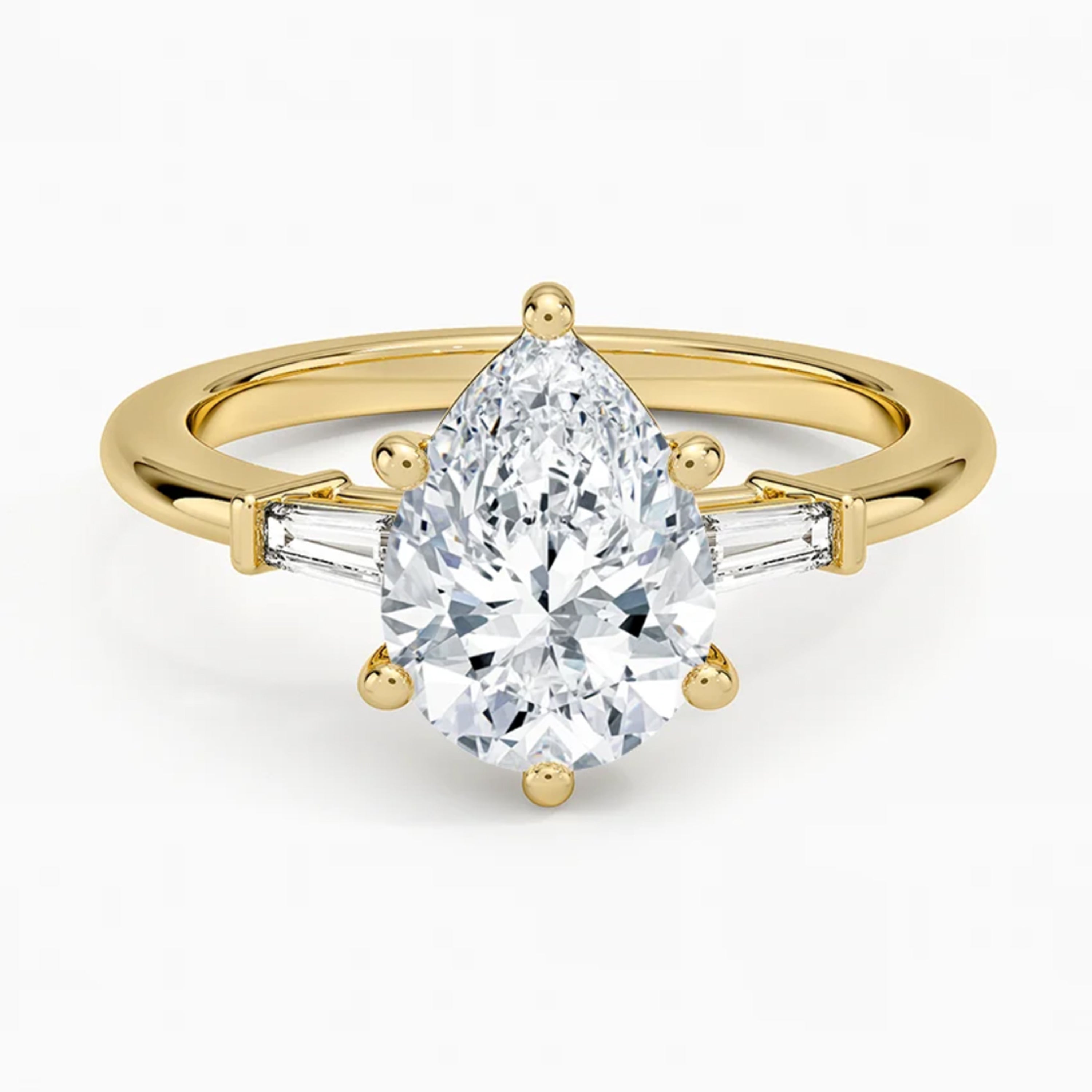 Legacy Pear Three-Stone Ring