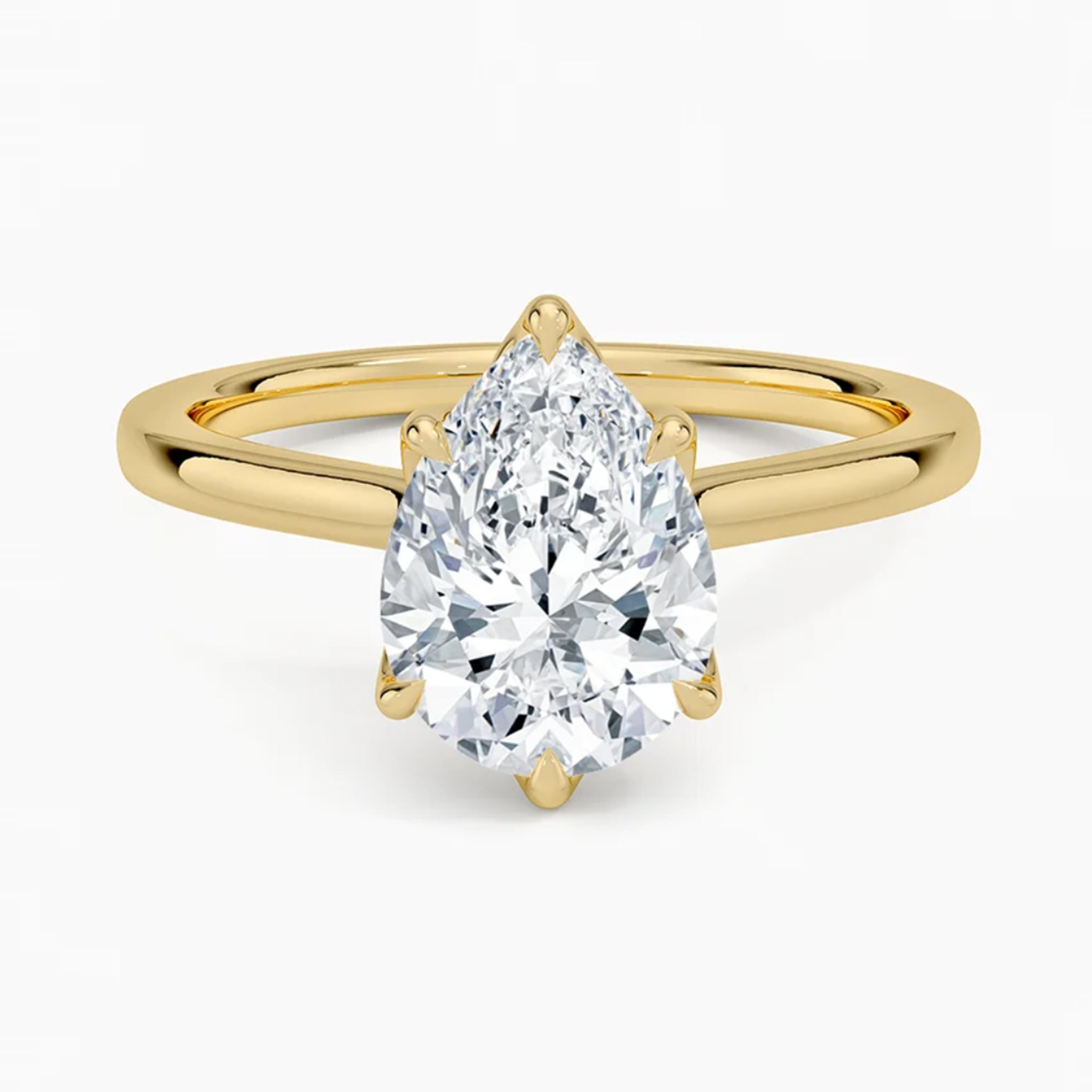 Flora Pear Solitaire Ring