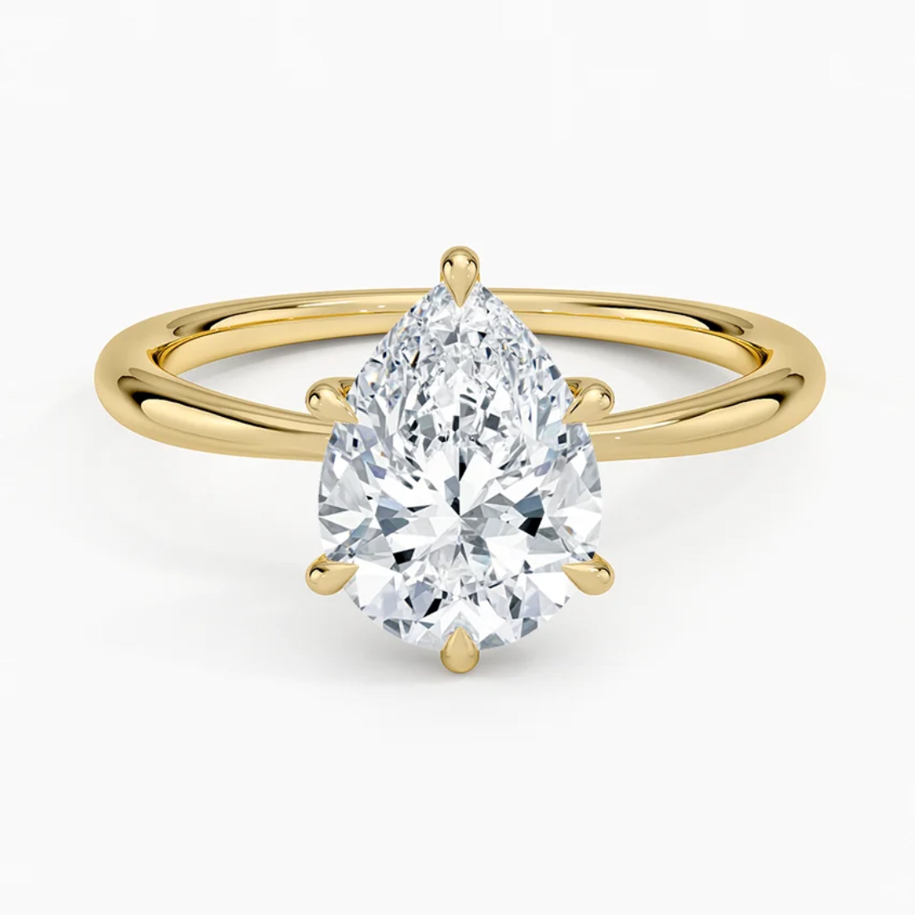 Iris Pear Solitaire Ring