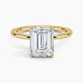 Classic Four-Prong Emerald Solitaire Ring