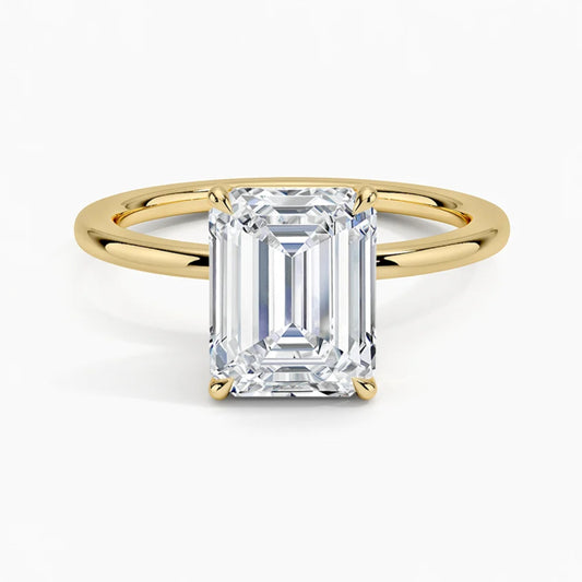 Classic Four-Prong Emerald Solitaire Ring