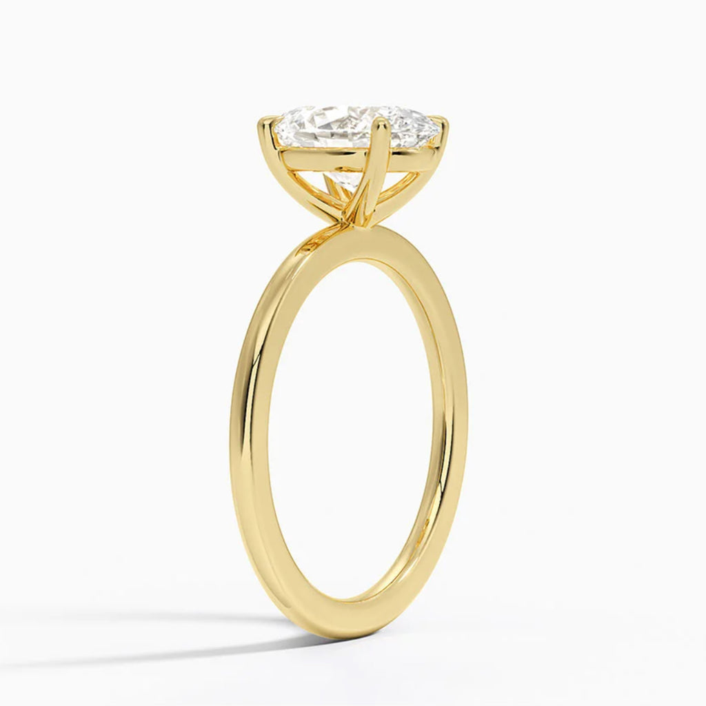 Classic Four-Prong Oval Solitaire Ring