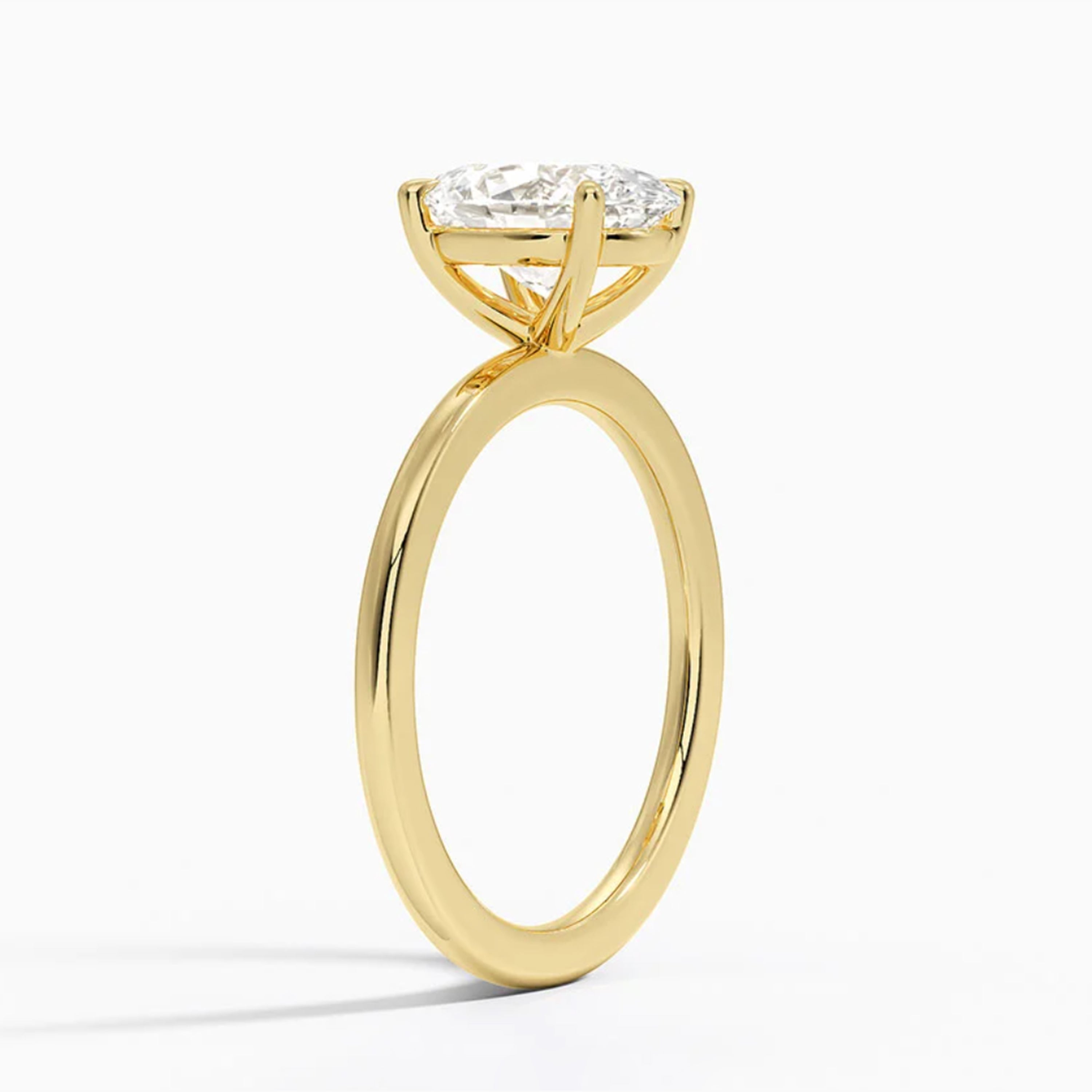 Classic Four-Prong Oval Solitaire Ring