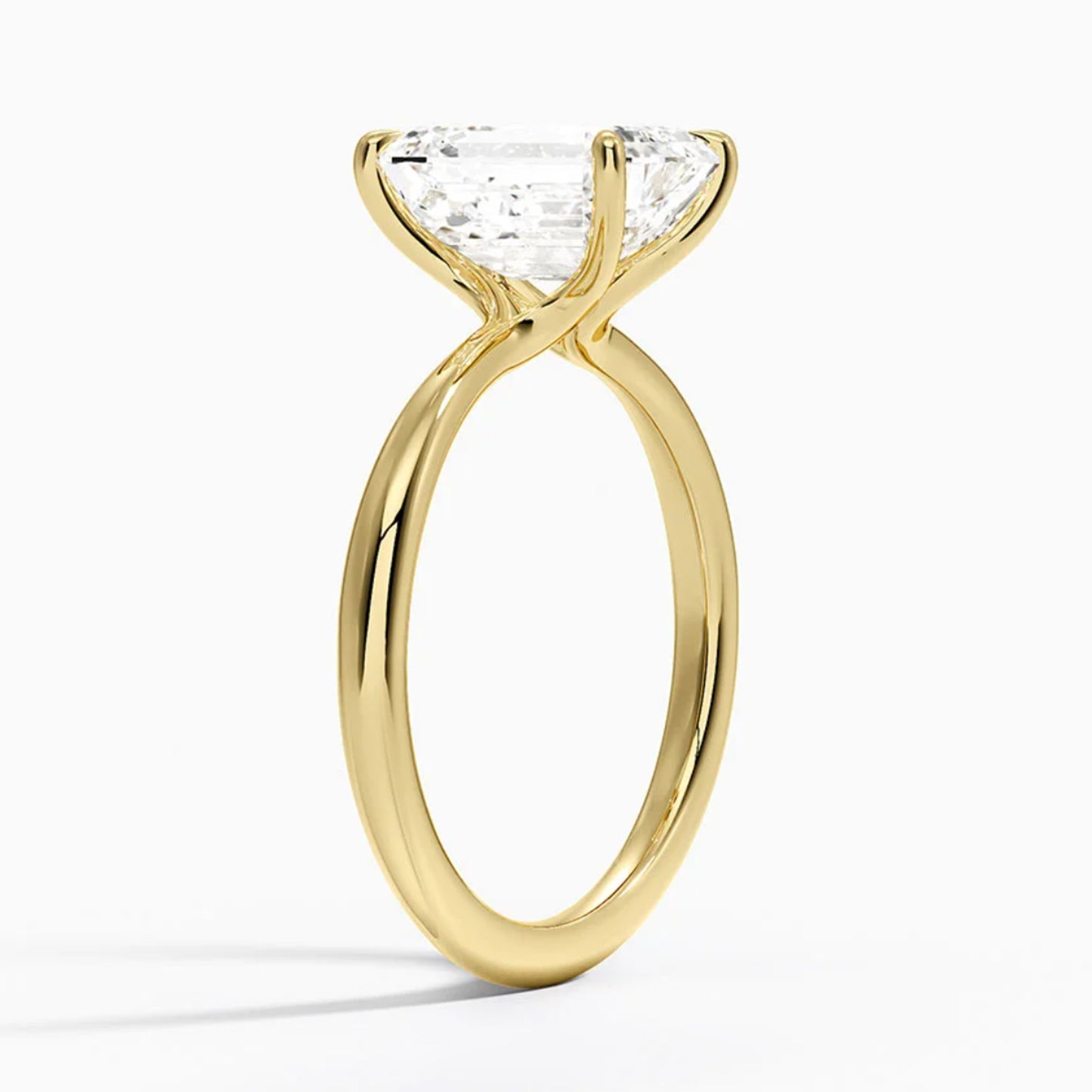 Iris Emerald Solitaire Ring