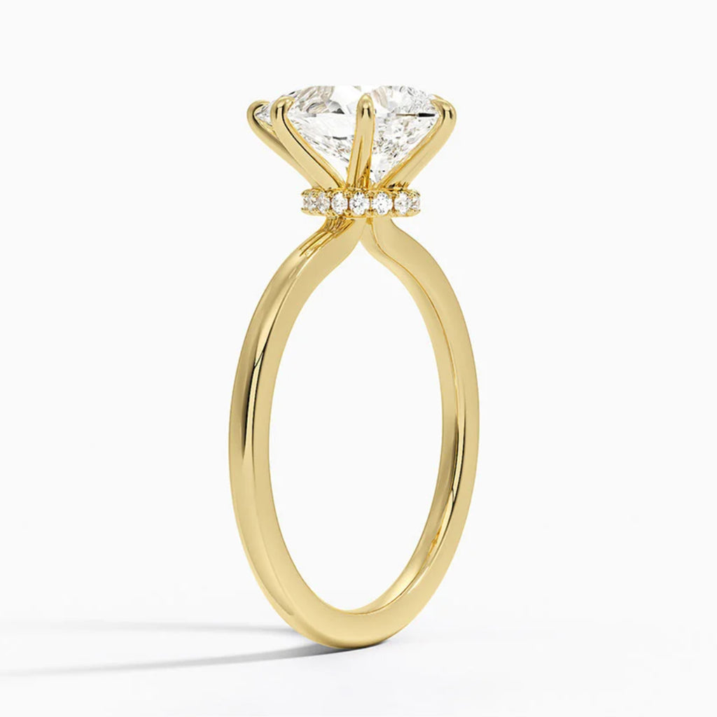 Hidden Halo Pear Solitaire Ring