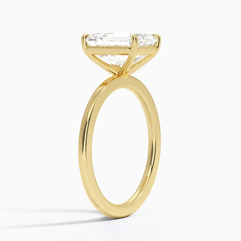 Classic Four-Prong Emerald Solitaire Ring
