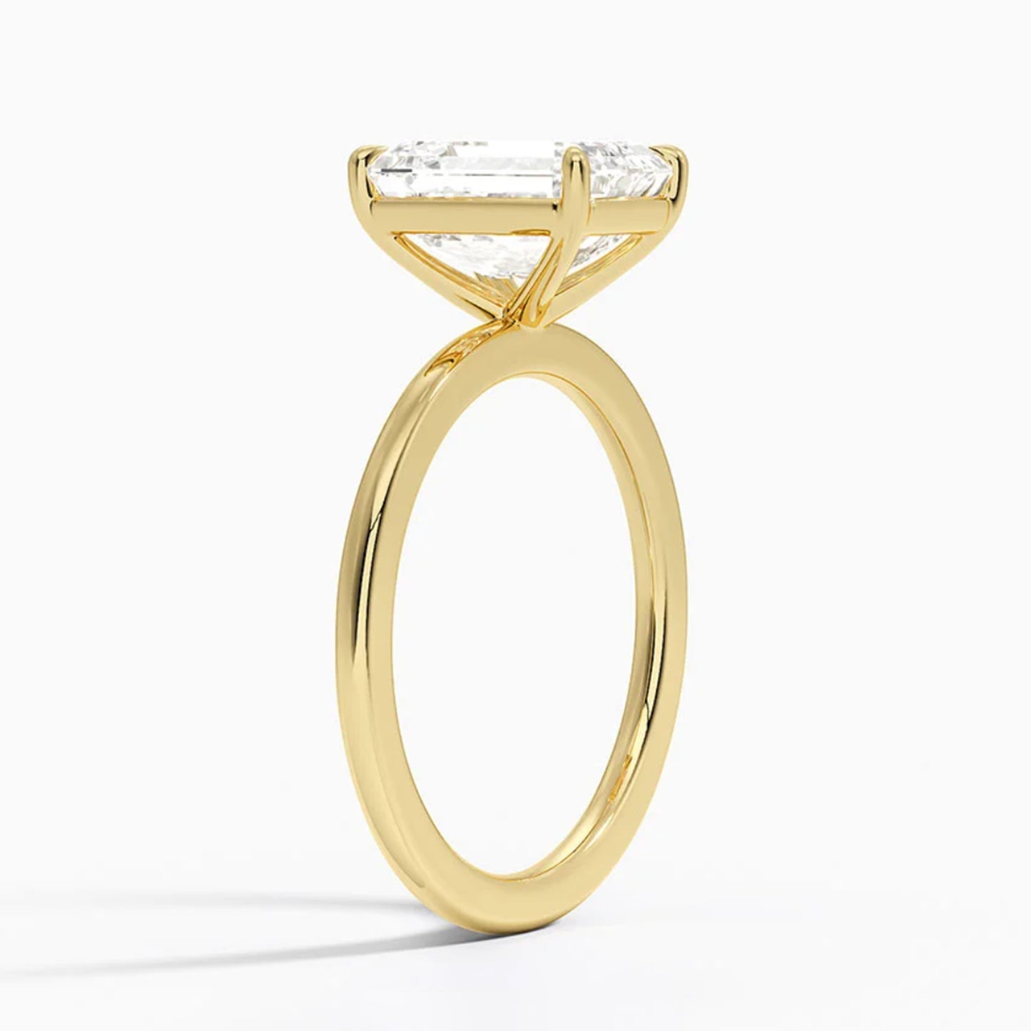 Classic Four-Prong Emerald Solitaire Ring