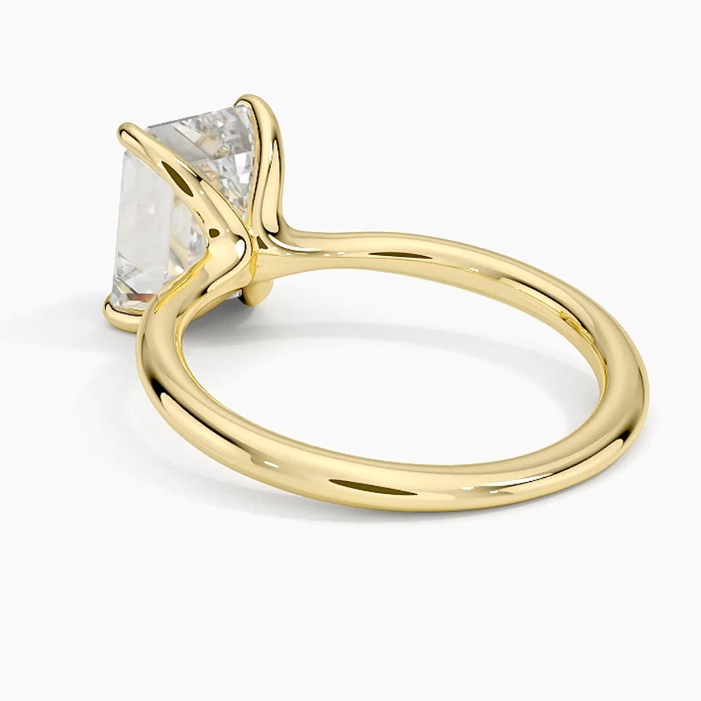 Iris Emerald Solitaire Ring