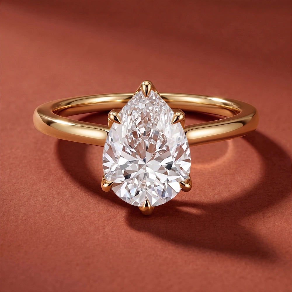 Flora Pear Solitaire Ring