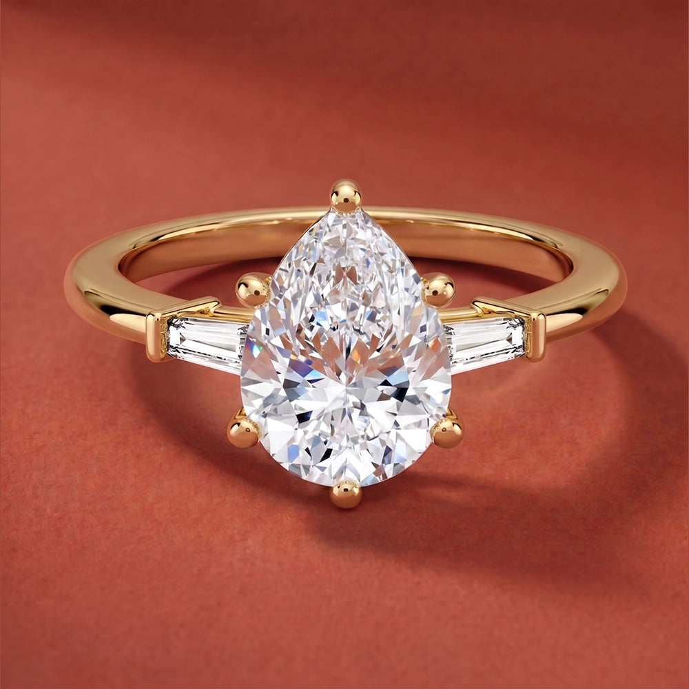 Legacy Pear Three-Stone Ring