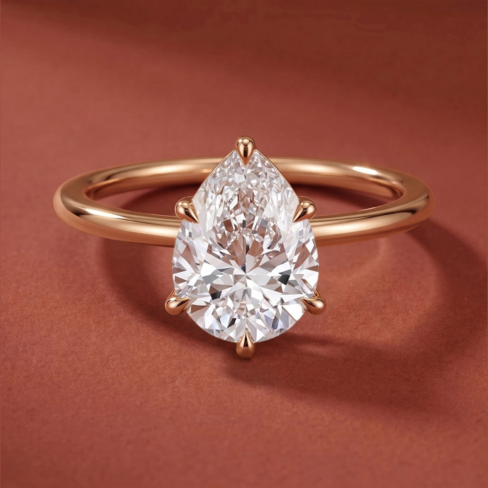 Iris Pear Solitaire Ring