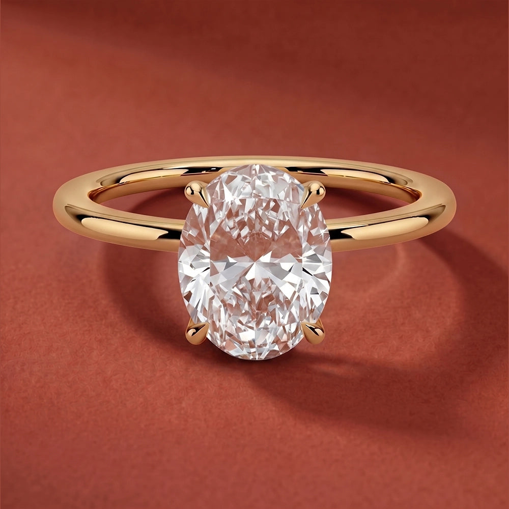 Classic Four-Prong Oval Solitaire Ring