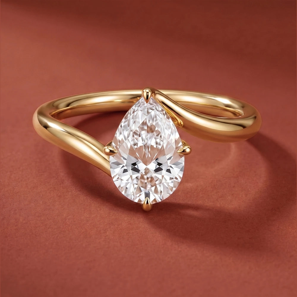 Embrace Pear Solitaire Ring