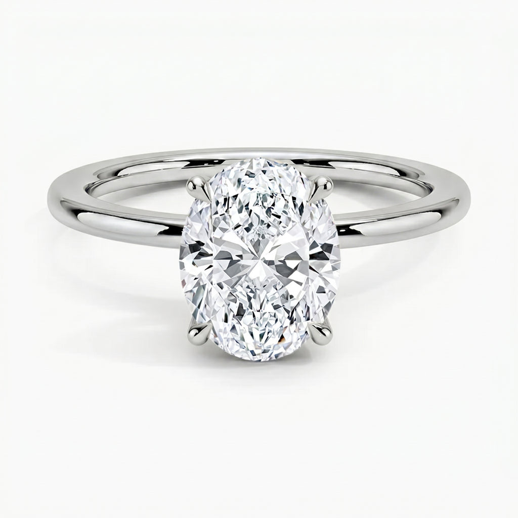 Classic Four-Prong Oval Solitaire Ring