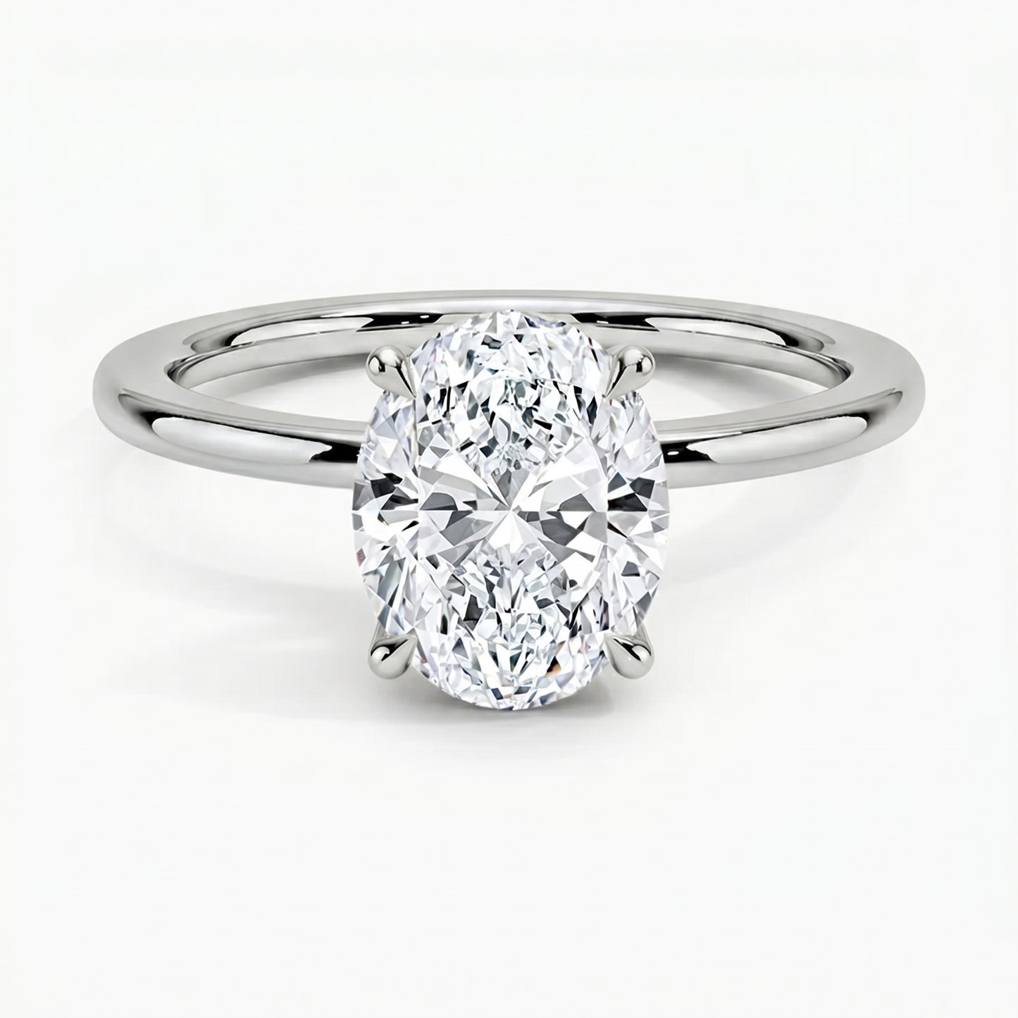 Classic Four-Prong Oval Solitaire Ring