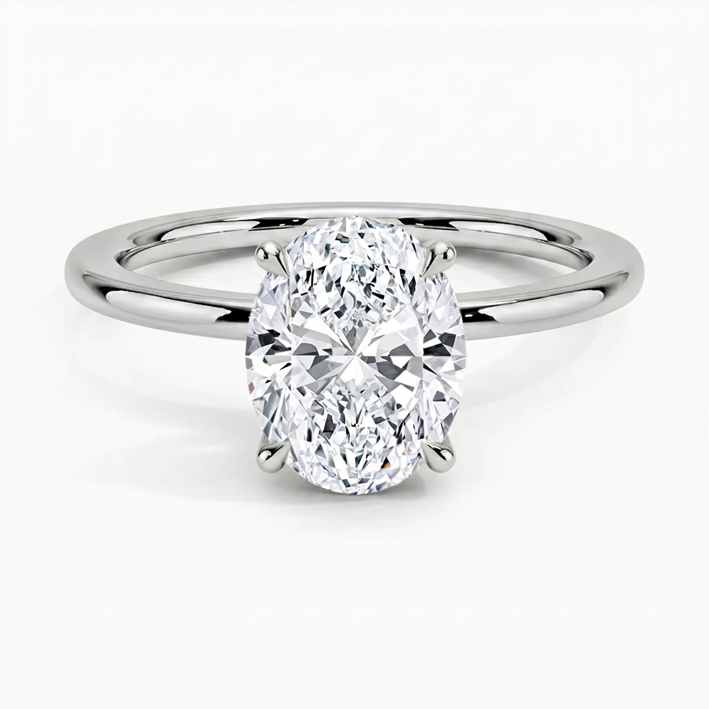 Classic Four-Prong Oval Solitaire Ring