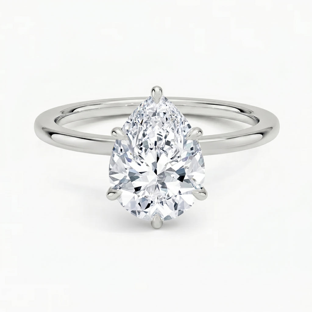Hidden Halo Pear Solitaire Ring