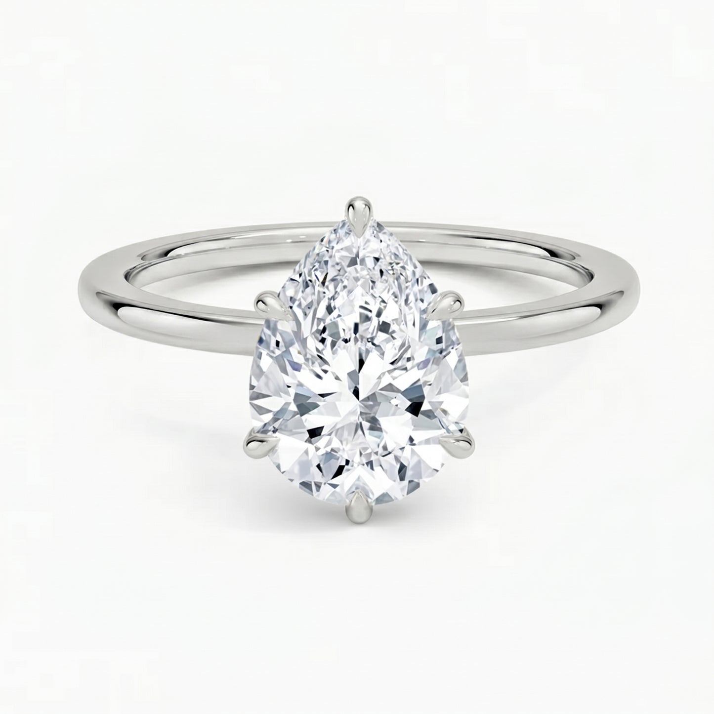 Hidden Halo Pear Solitaire Ring