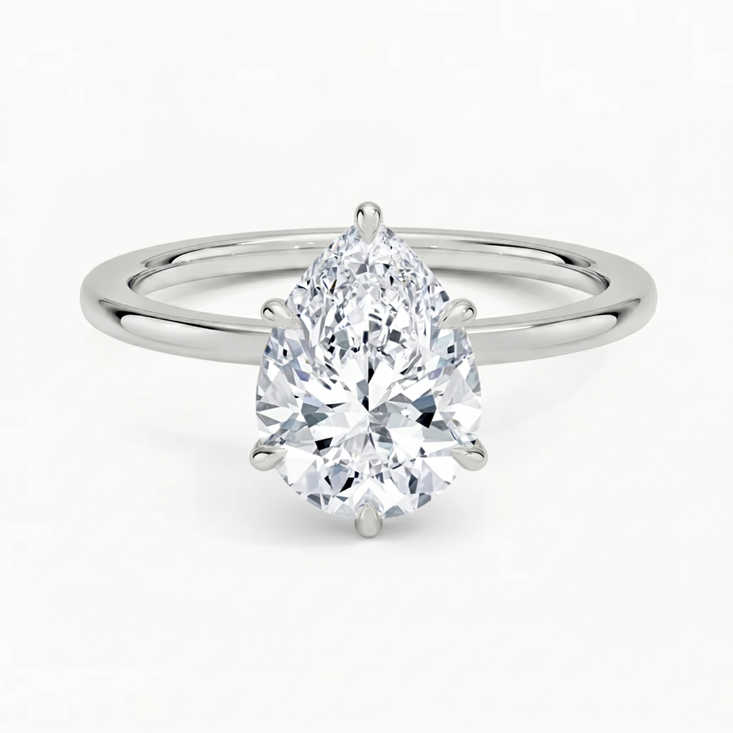 Hidden Halo Pear Solitaire Ring