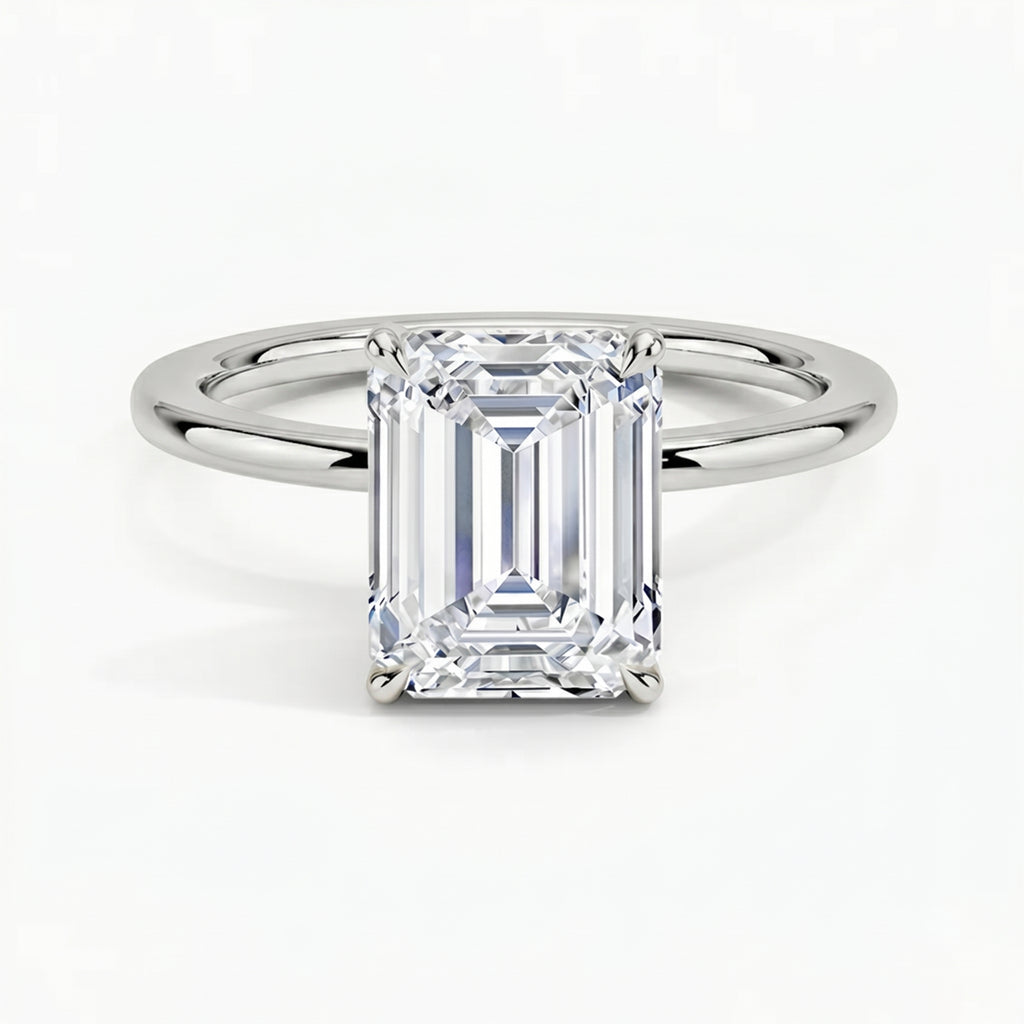 Classic Four-Prong Emerald Solitaire Ring