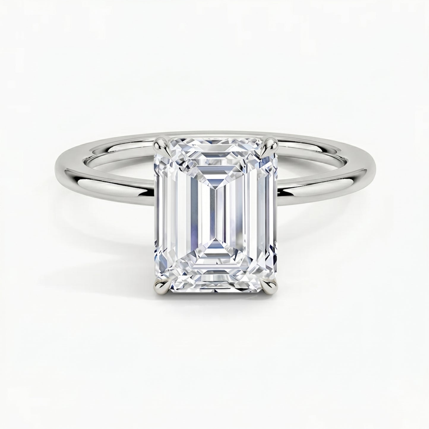 Classic Four-Prong Emerald Solitaire Ring