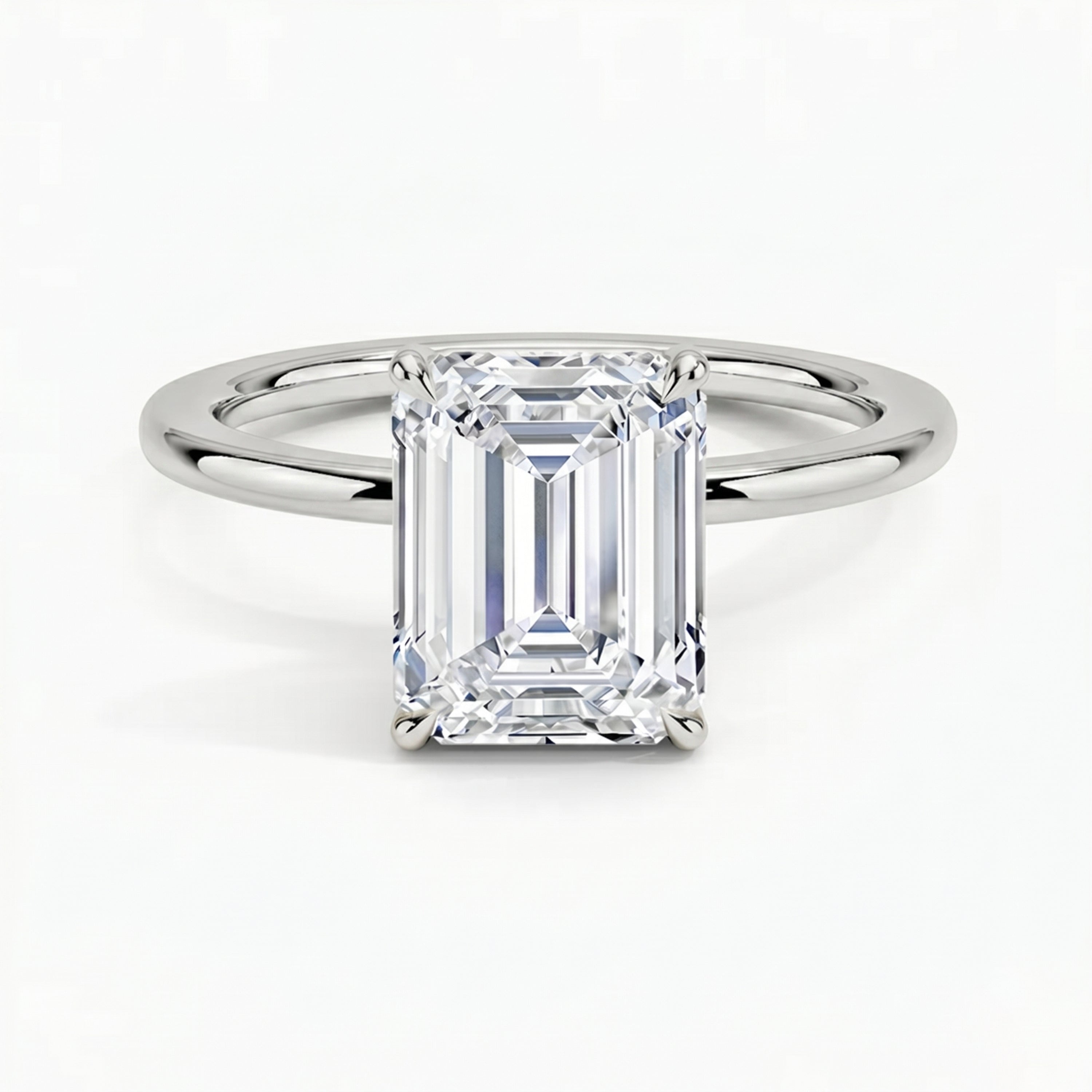 Classic Four-Prong Emerald Solitaire Ring