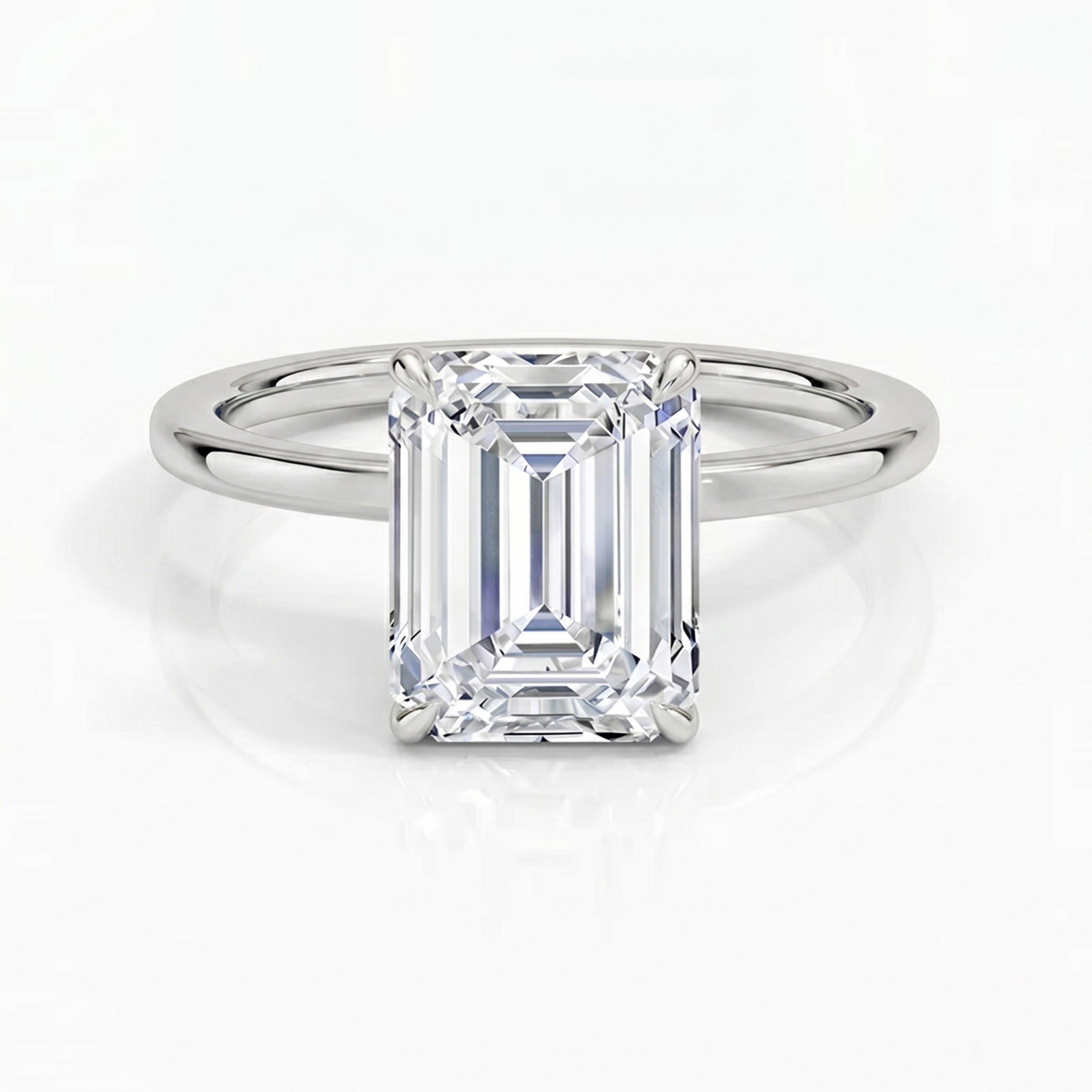 Hidden Halo Emerald Solitaire Ring