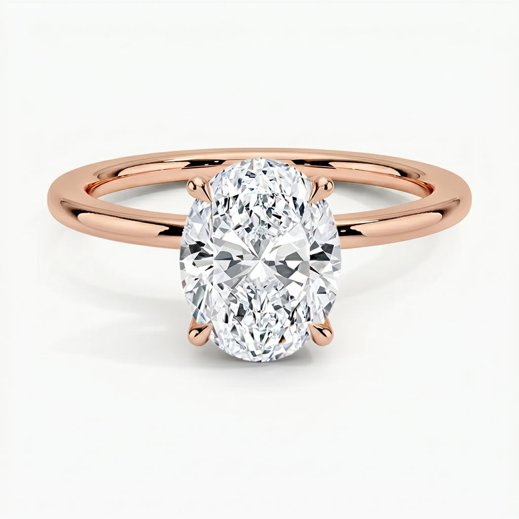 Classic Four-Prong Oval Solitaire Ring