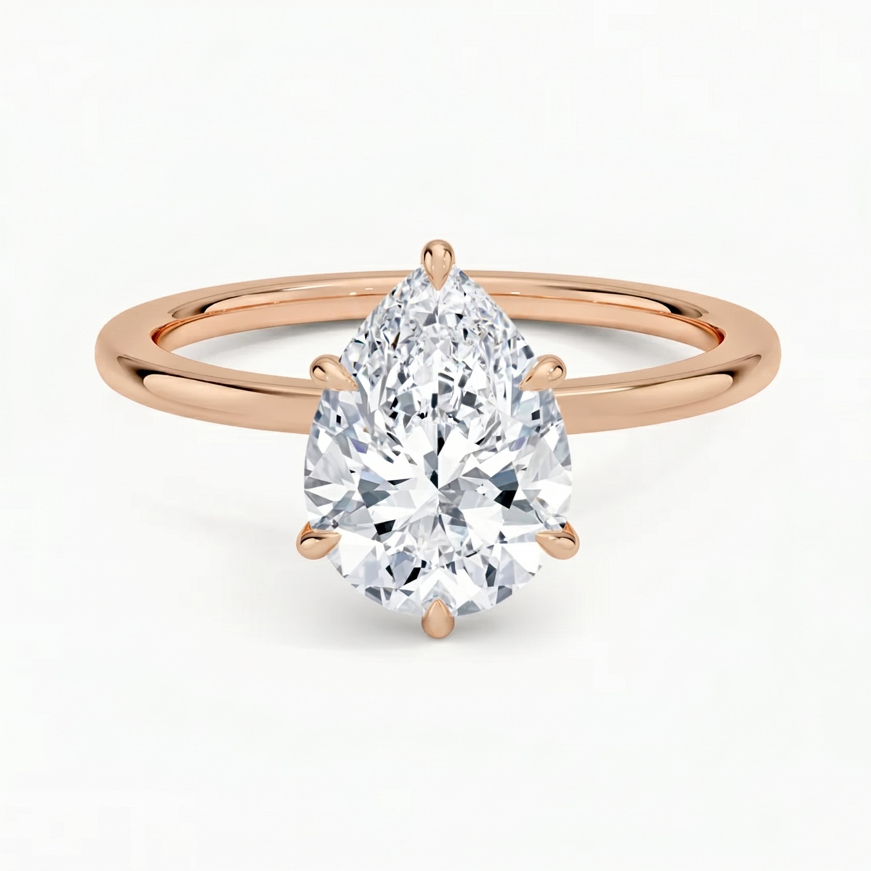 Hidden Halo Pear Solitaire Ring