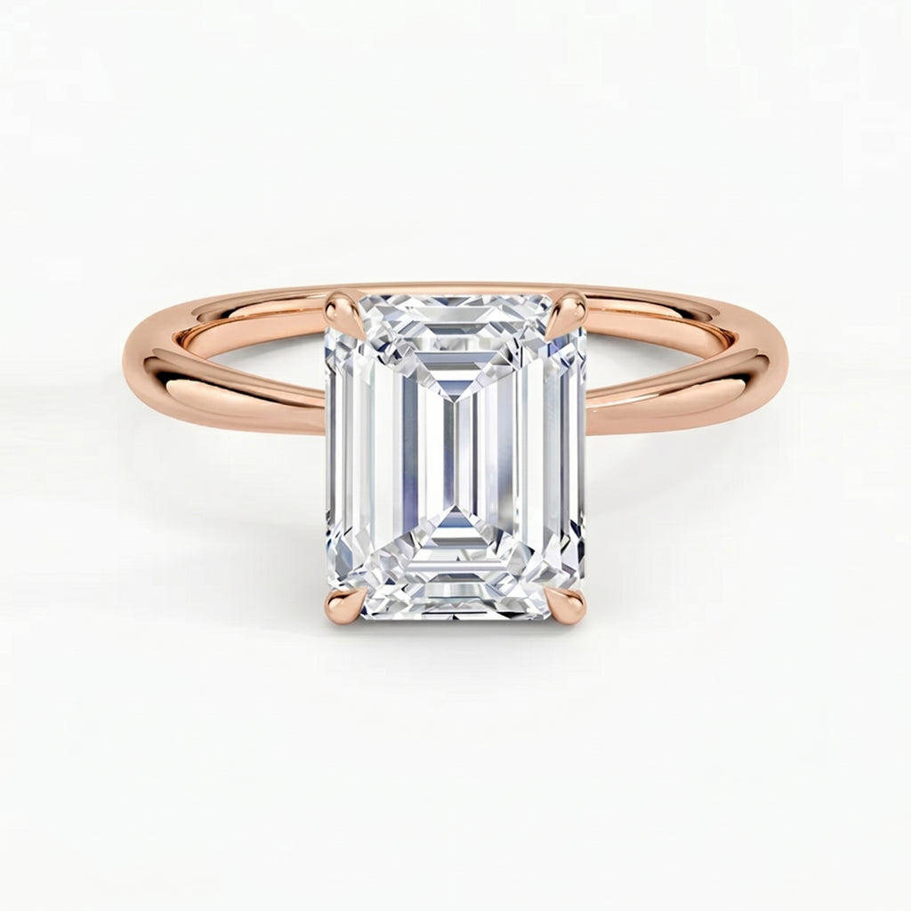 Iris Emerald Solitaire Ring