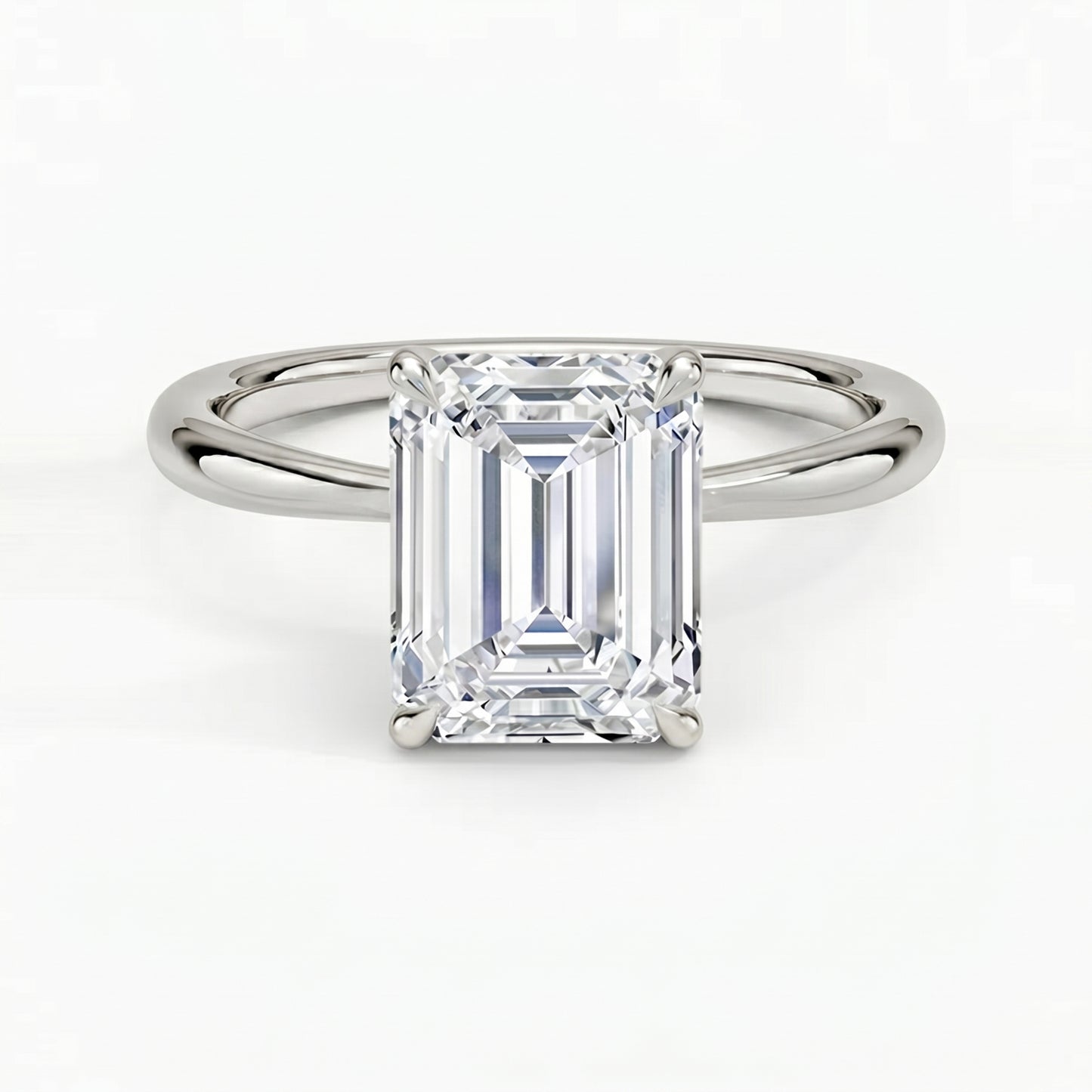 Iris Emerald Solitaire Ring