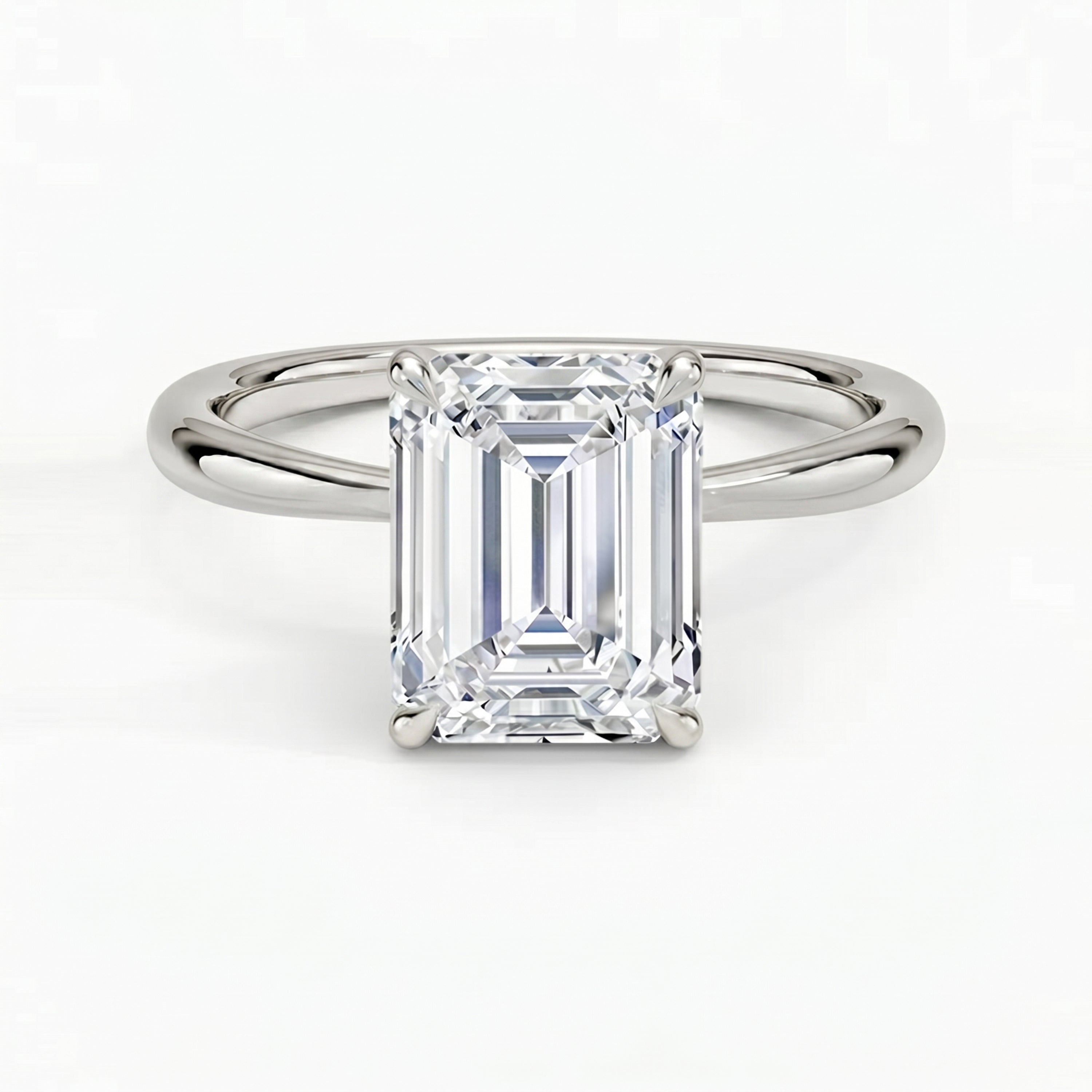 Iris Emerald Solitaire Ring