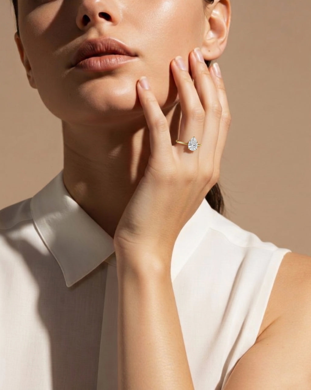 Hidden Halo Pear Solitaire Ring
