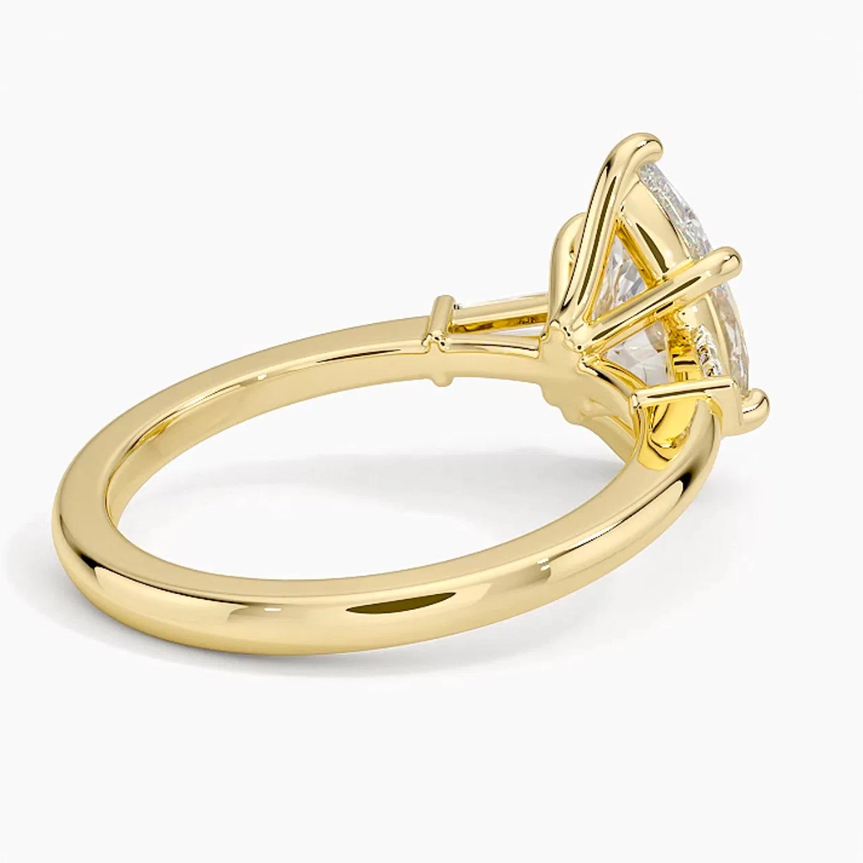 Legacy Pear Three-Stone Ring