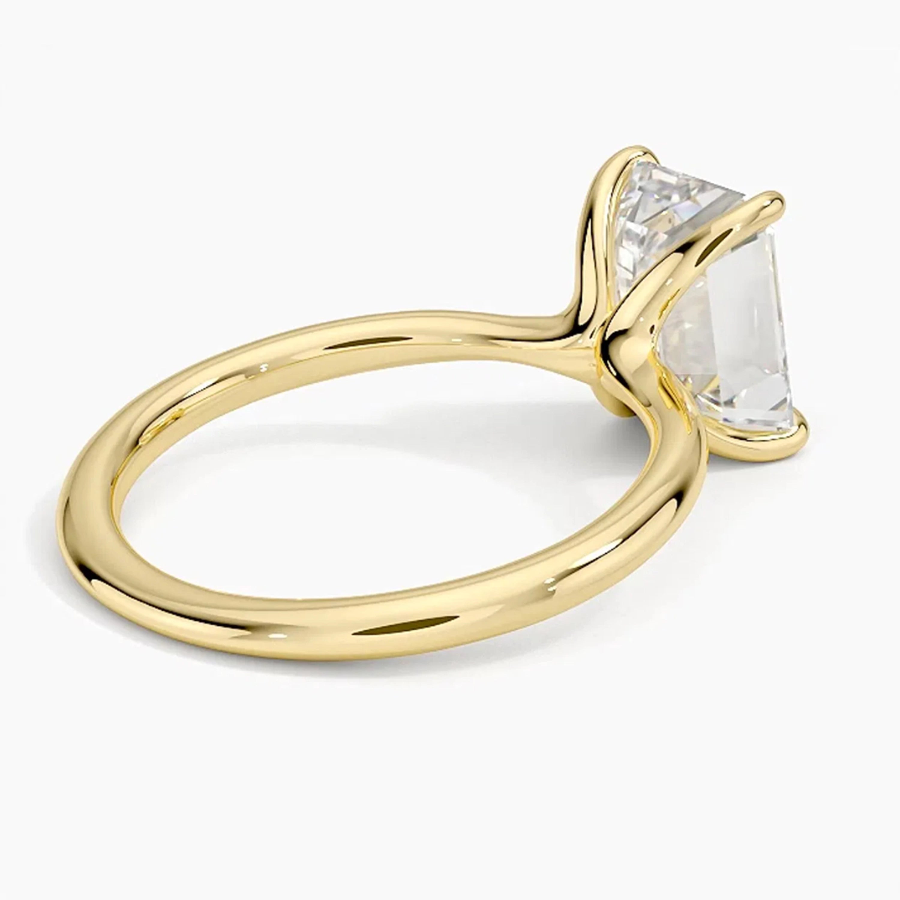 Iris Emerald Solitaire Ring