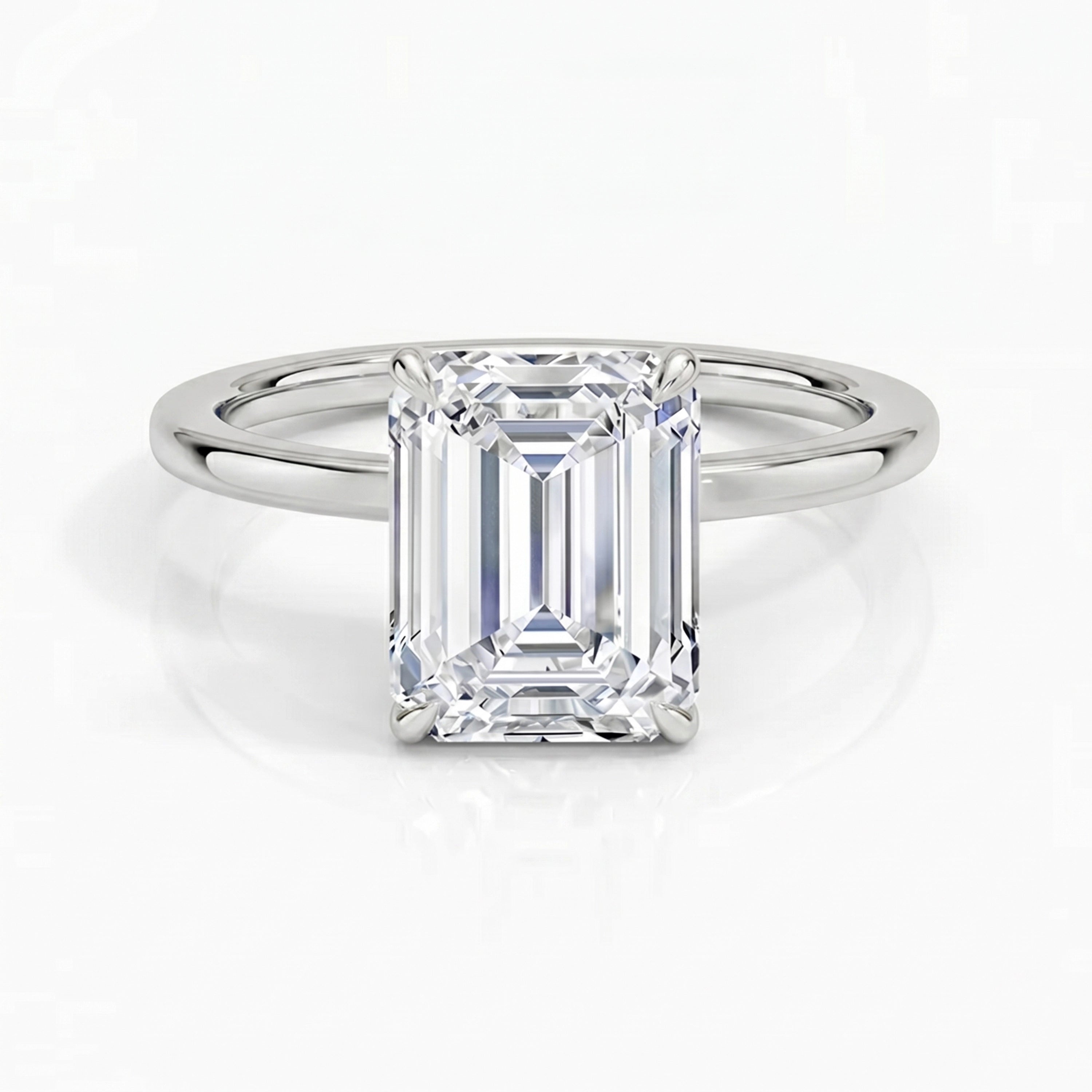 Hidden Halo Emerald Solitaire Ring