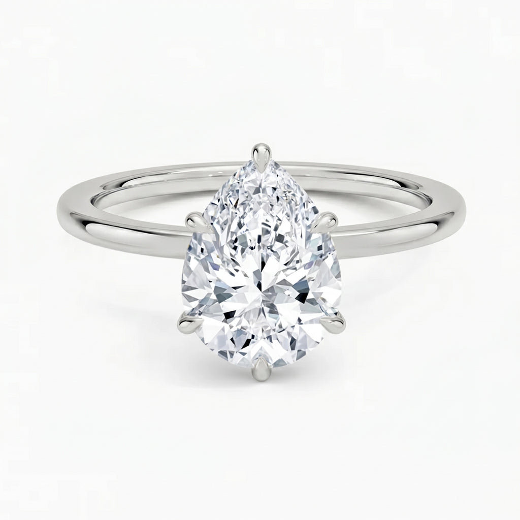 Hidden Halo Pear Solitaire Ring