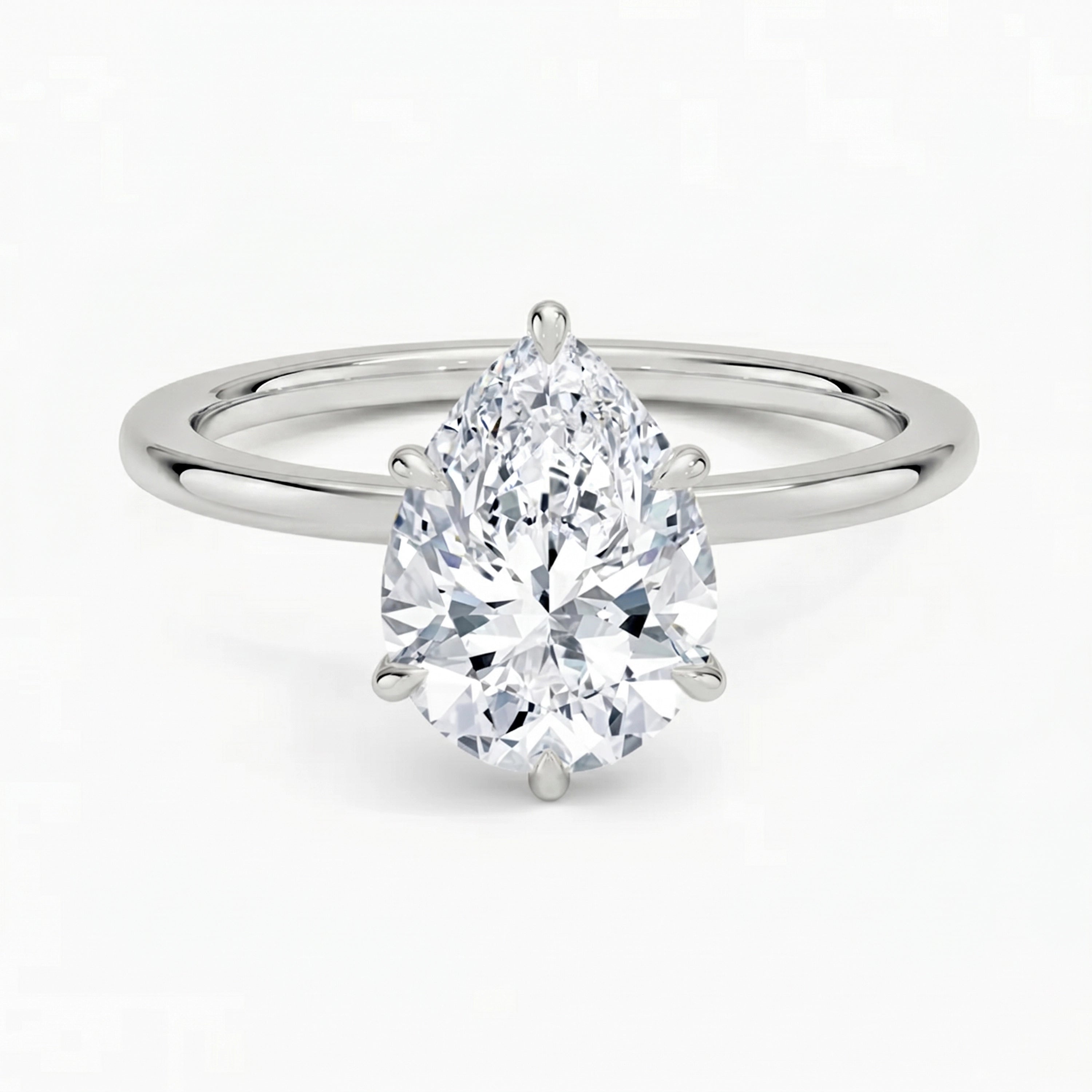 Hidden Halo Pear Solitaire Ring