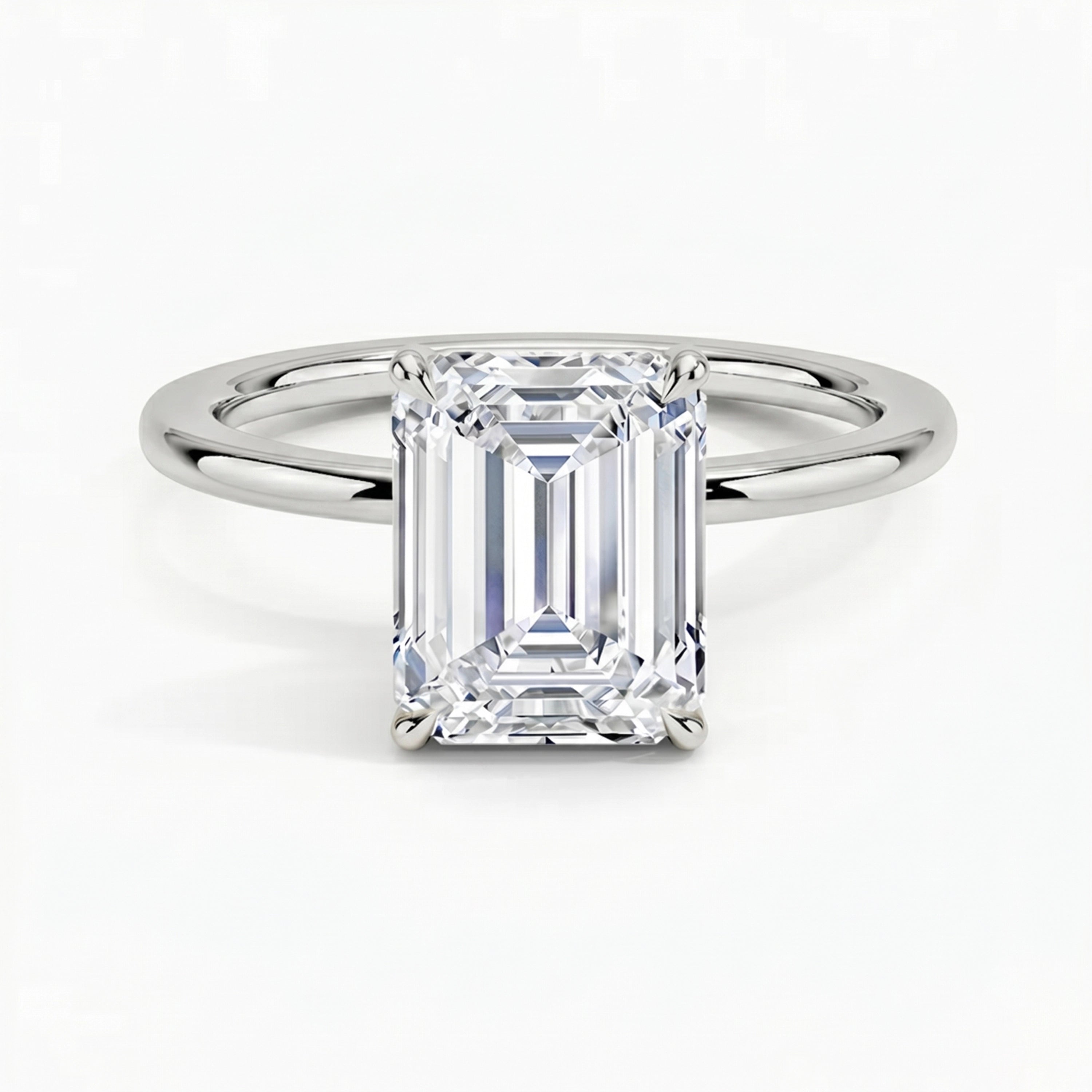 Classic Four-Prong Emerald Solitaire Ring