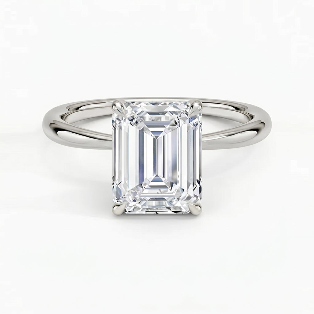 Iris Emerald Solitaire Ring