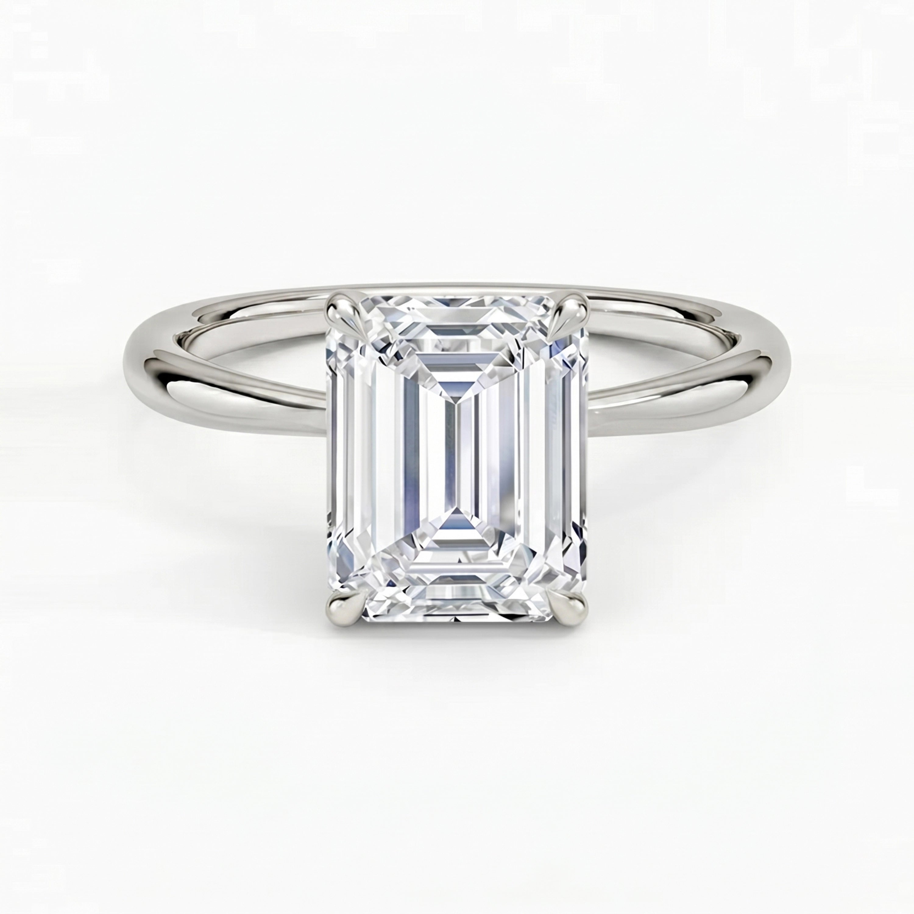 Iris Emerald Solitaire Ring