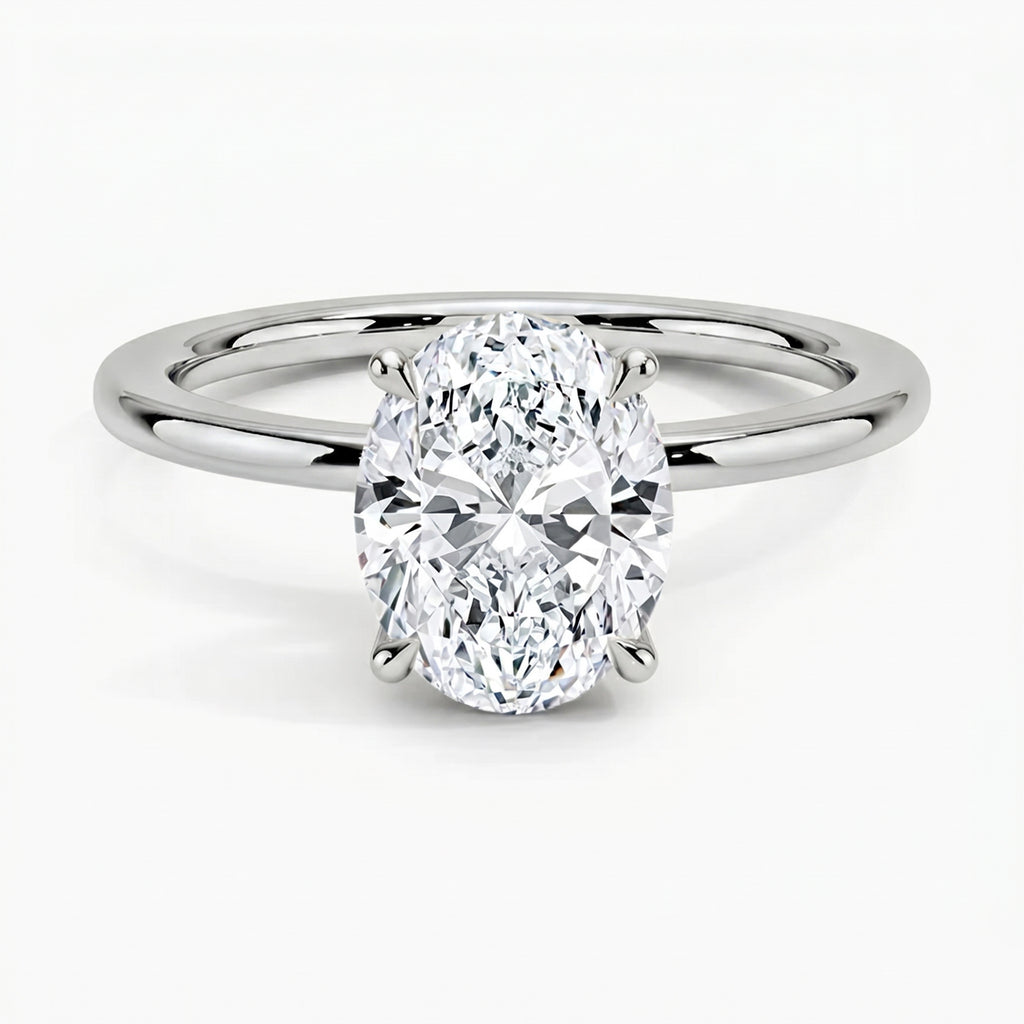 Classic Four-Prong Oval Solitaire Ring